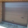 секционные гаражные ворота коричневого цвета
